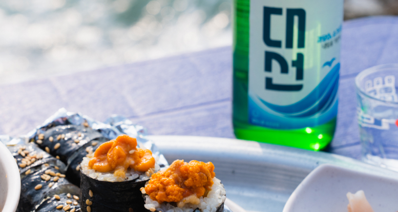 Sea urchin roe gimbap, the representative menu of Yeongdo Haenyeochon, and Daesun soju, representing Busan