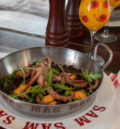 Octopus ink risotto with a sophisticated flavor