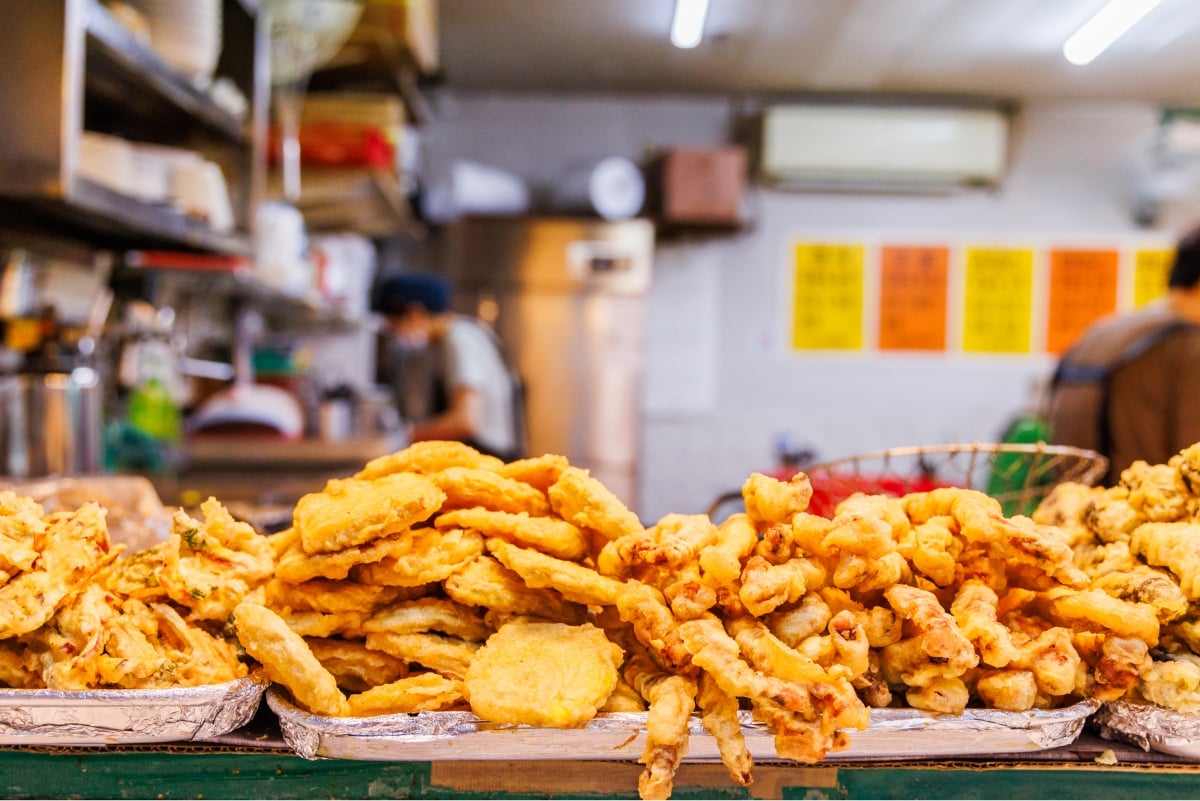 Various kinds of fried food on display in the store