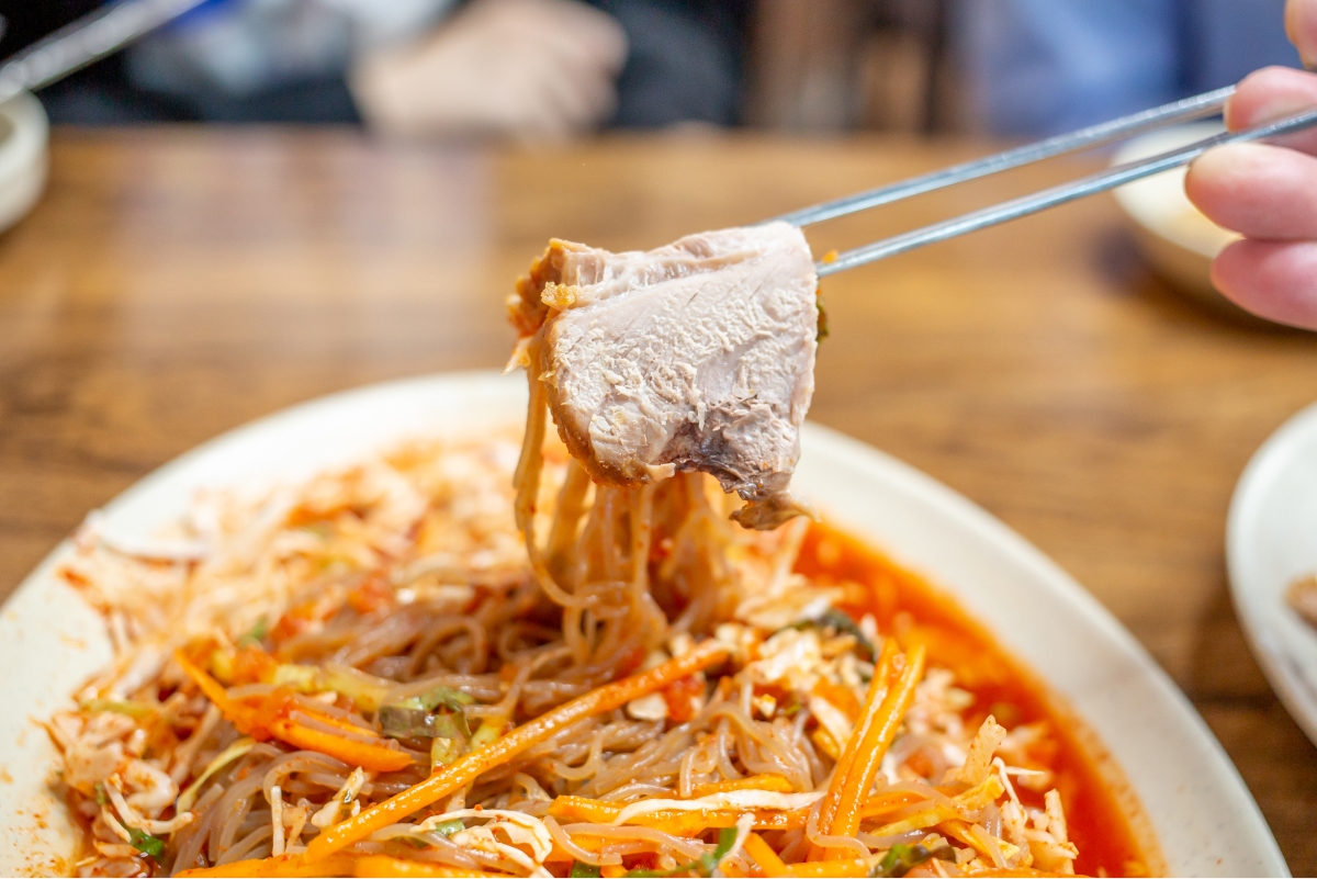 Jokbal with spicy noodles
