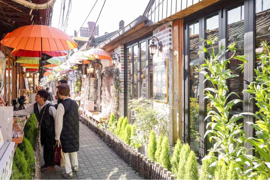 Inseok-dong Cafe Street with various cafes and shops