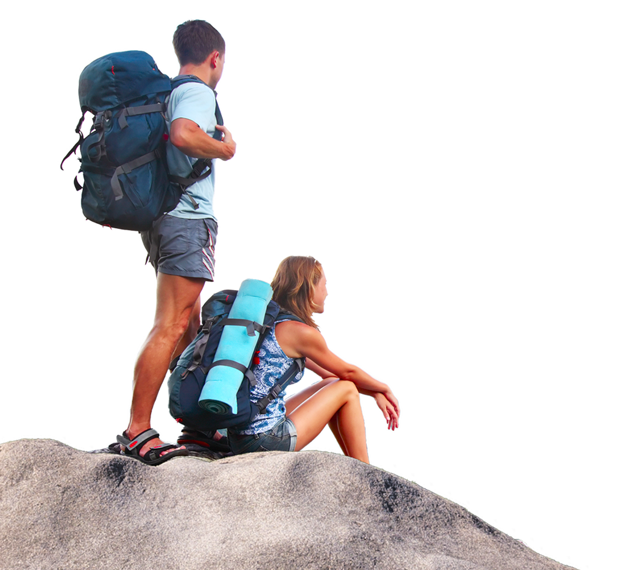 Young tourists with backpacks enjoying valley view from top of a mountain